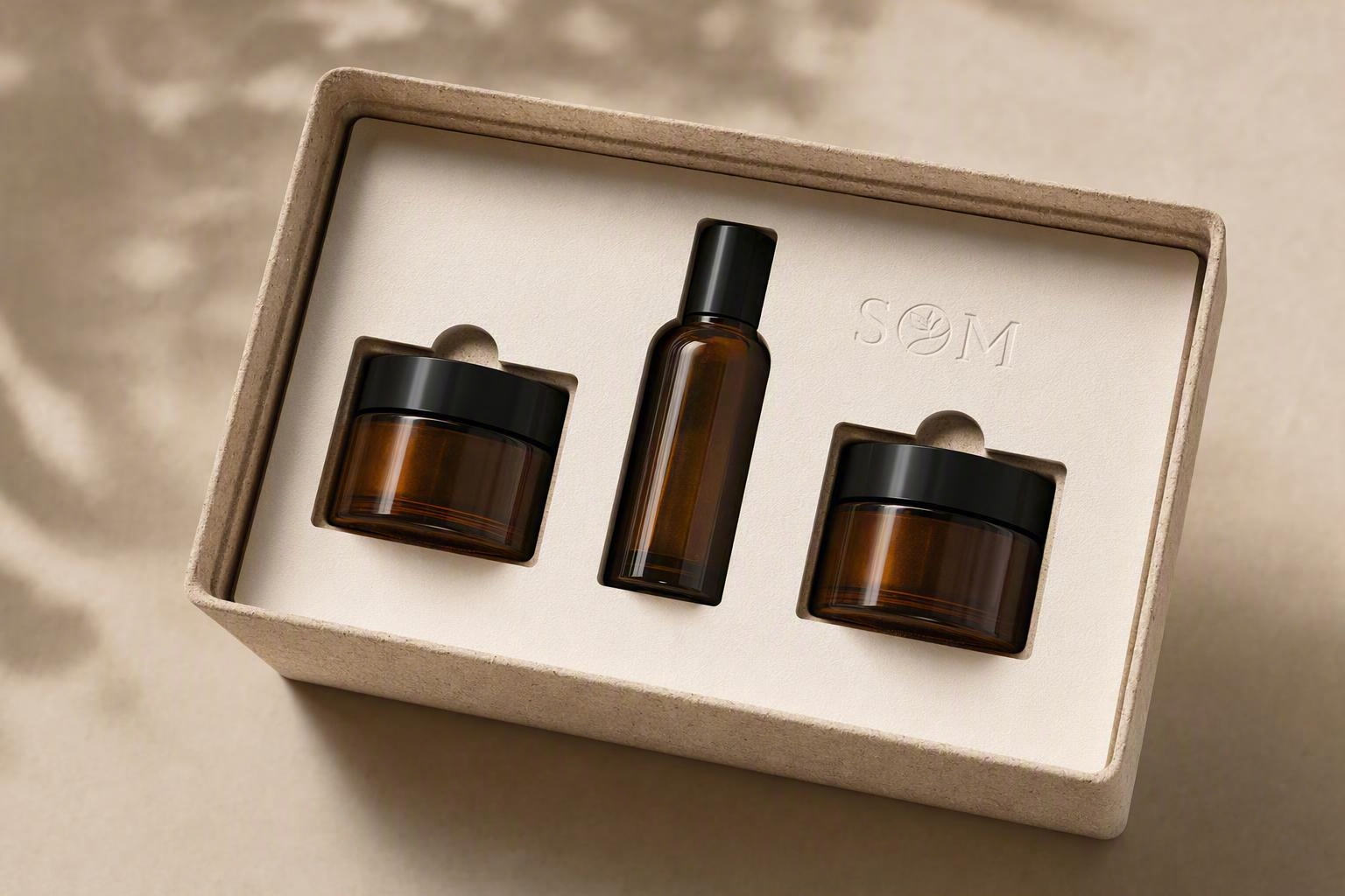 SOLM moulded-pulp custom insert engineered around cosmetic vessels